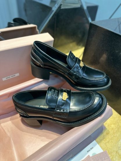Replica Miu Miu Brushed leather loafers metal coin #4025
